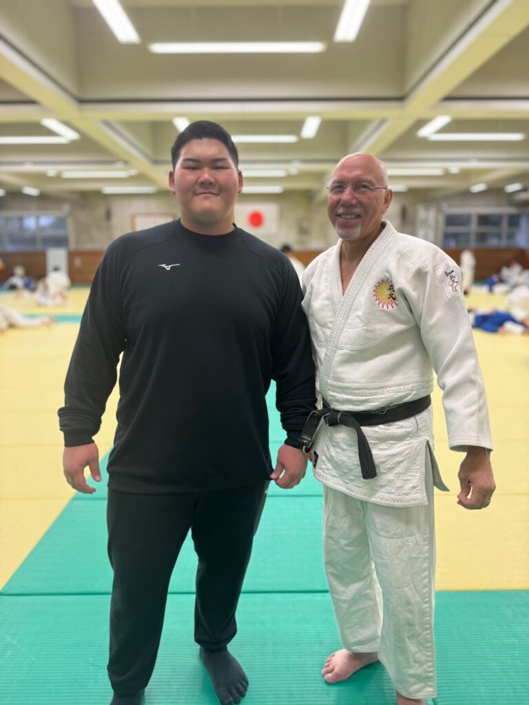 Dan Augustine with Saito, Tatsuru, All Japan champion, at Kokushikan University