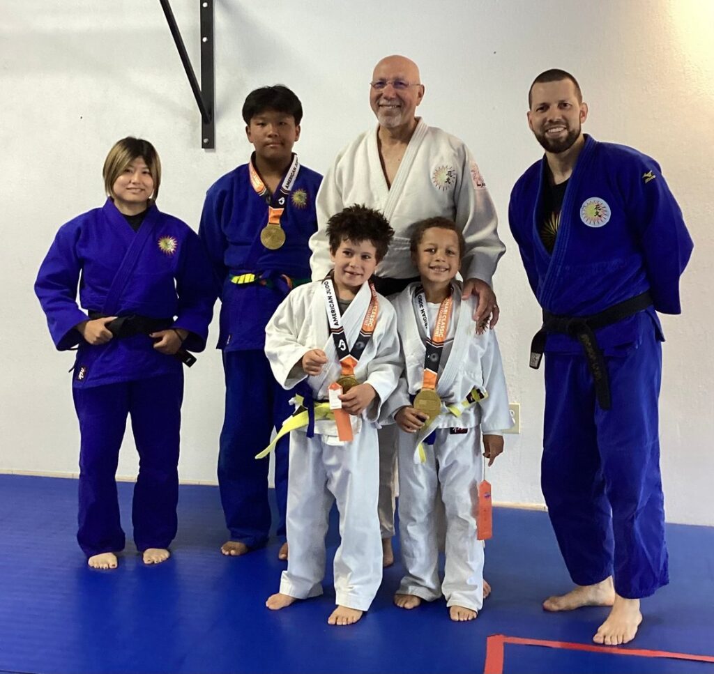 Back: Sana Sensei, Raangnzen winner of the Best Technique, Dan Augustine, Yuiii Sensei; Front: Milo winner